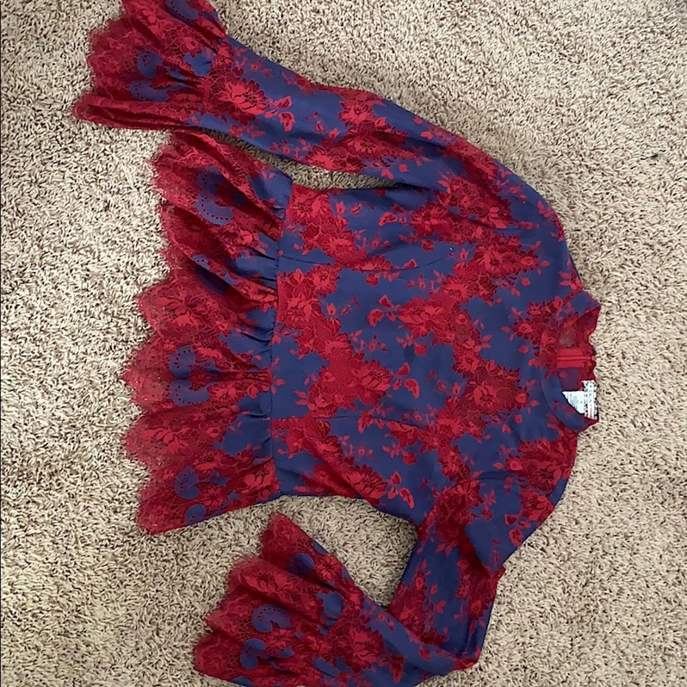 Lace peplum top semi sheer from Flying tomatoes
